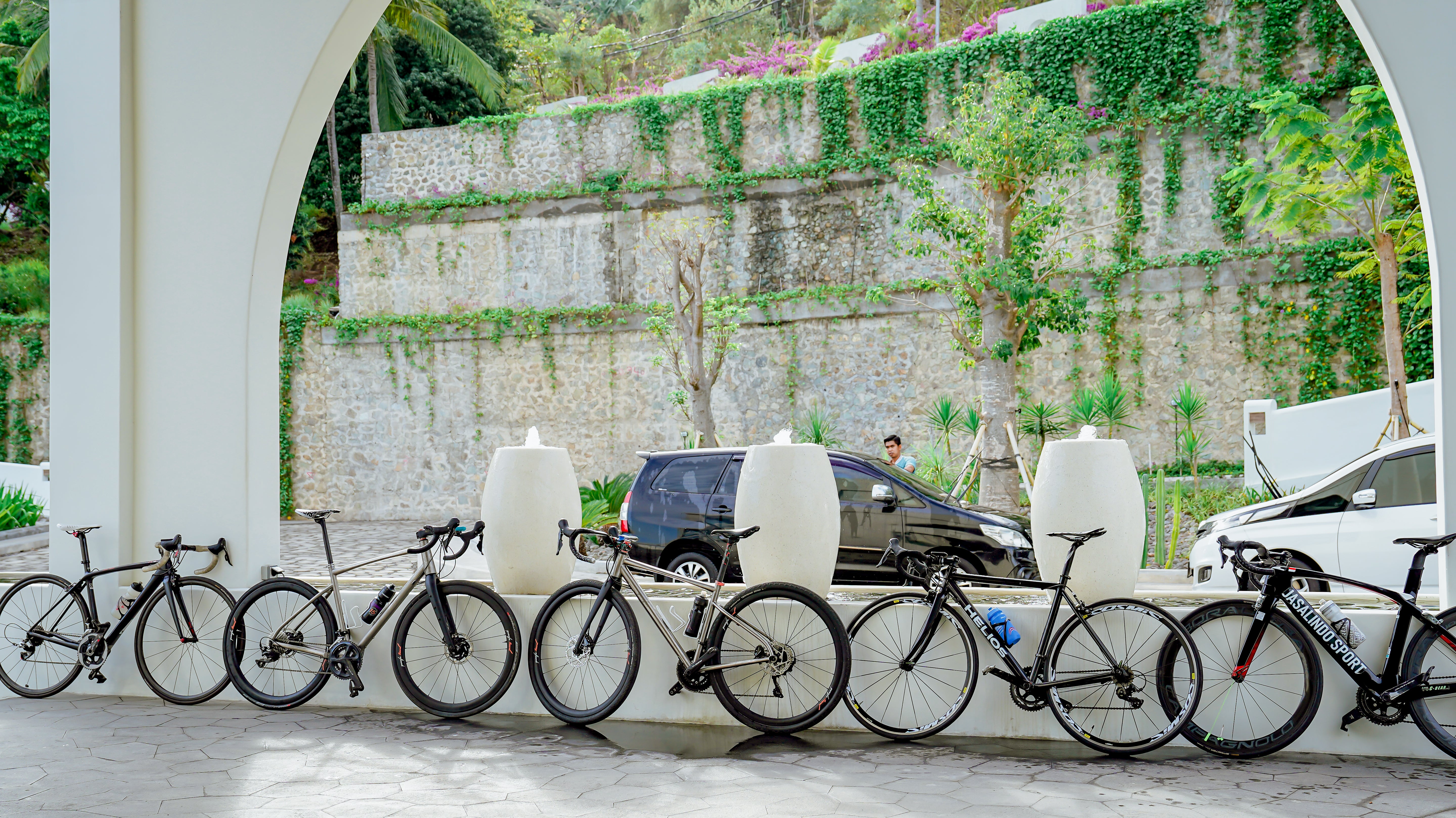 Qunafa support van following cyclists through Bali countryside with guide assistance