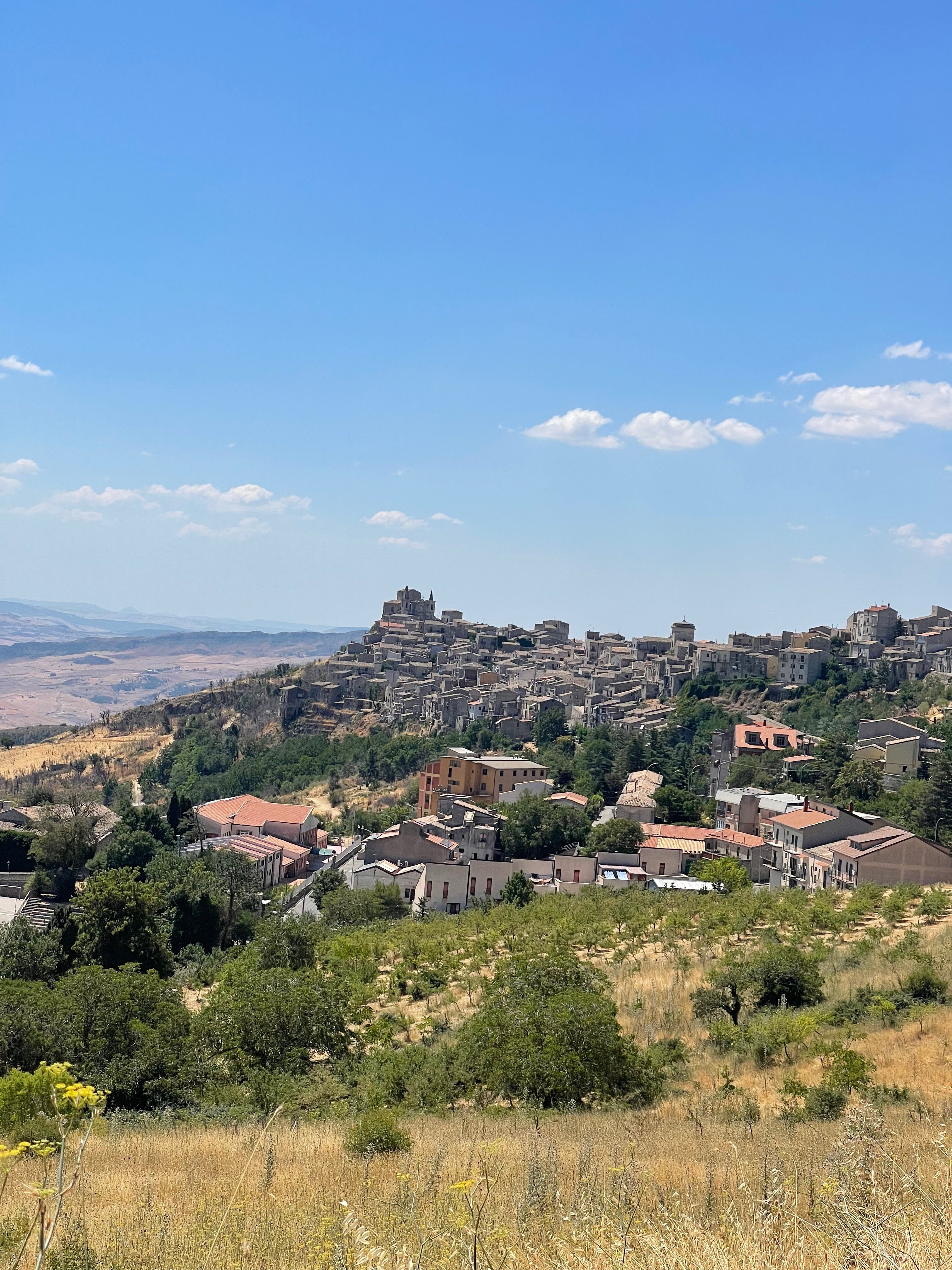 Coastal descent towards Cefalù on a Madonie Sicily cycling tour with sea views