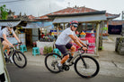 Close-up of Shahrazad titanium bike resting against traditional Balinese temple gate